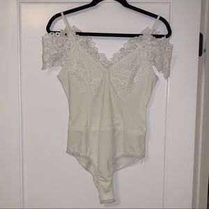 Never worn Hello Molly Bodysuit